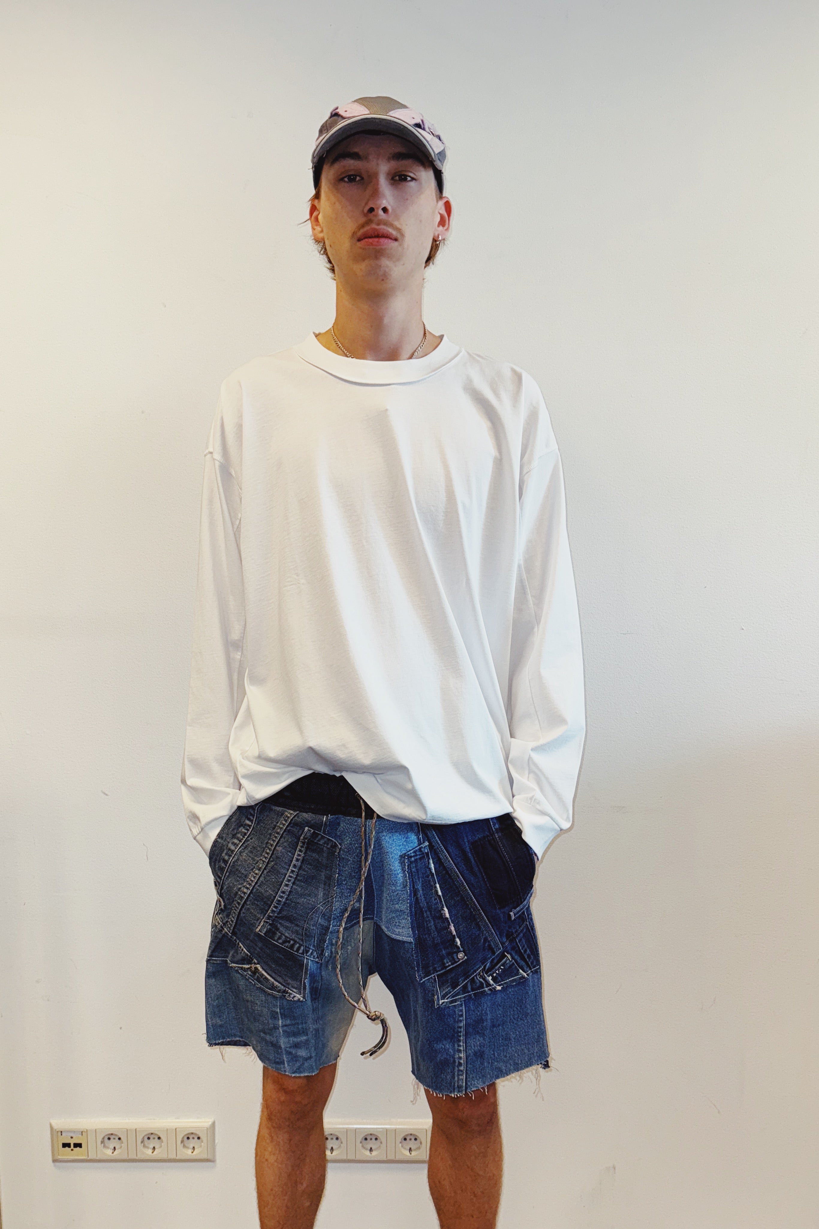 REWORKED RAW DENIM SHORTS